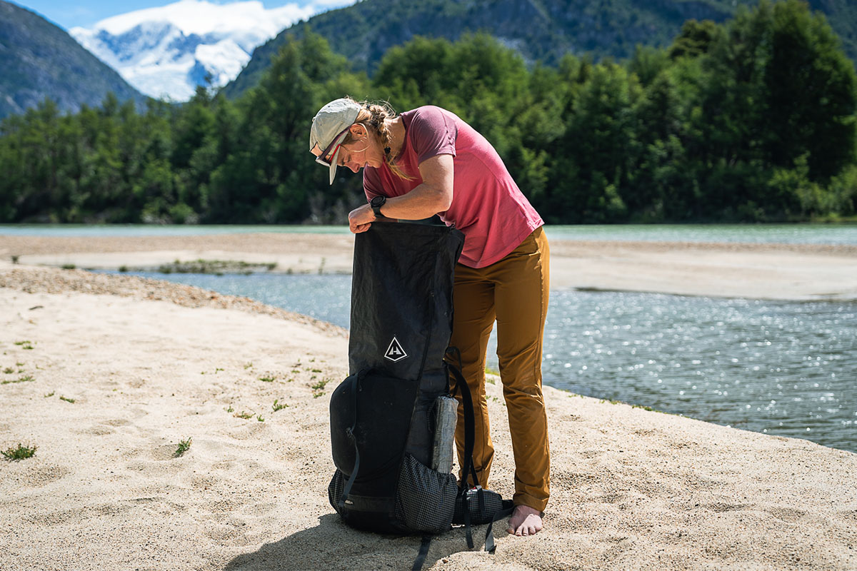 Ultralight pack (reaching into Hyperlite Unbound roll-top)